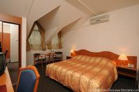 discounted mansard room in Eger with half board package